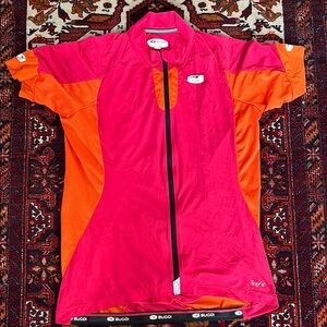 SUGOI Pink and Orange Fitted Cycling Jersey